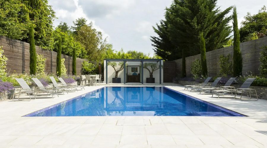 A swimming pool as a focal point in a garden design.