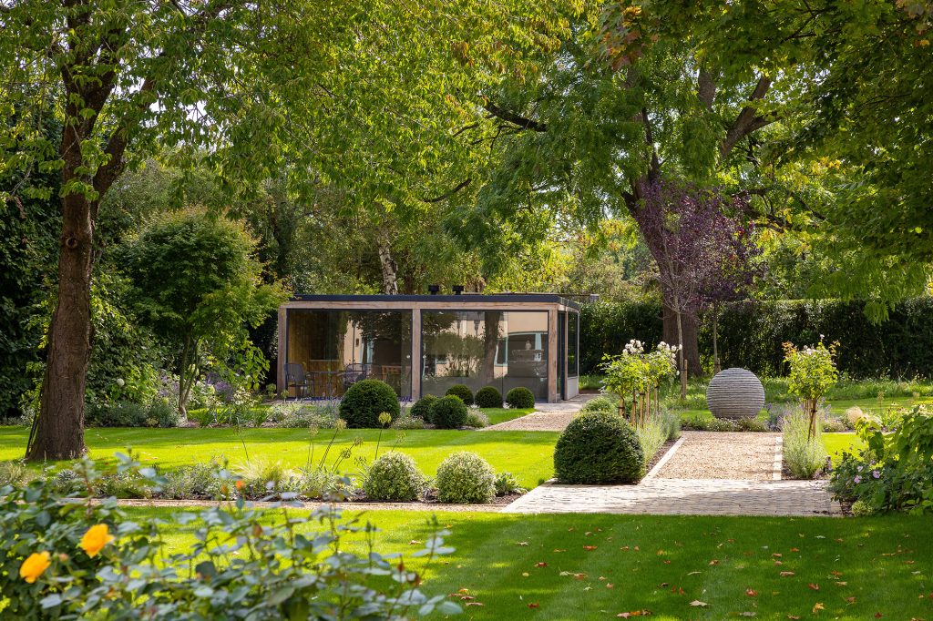 Low maintenance evergreens provide year-round structure in the garden